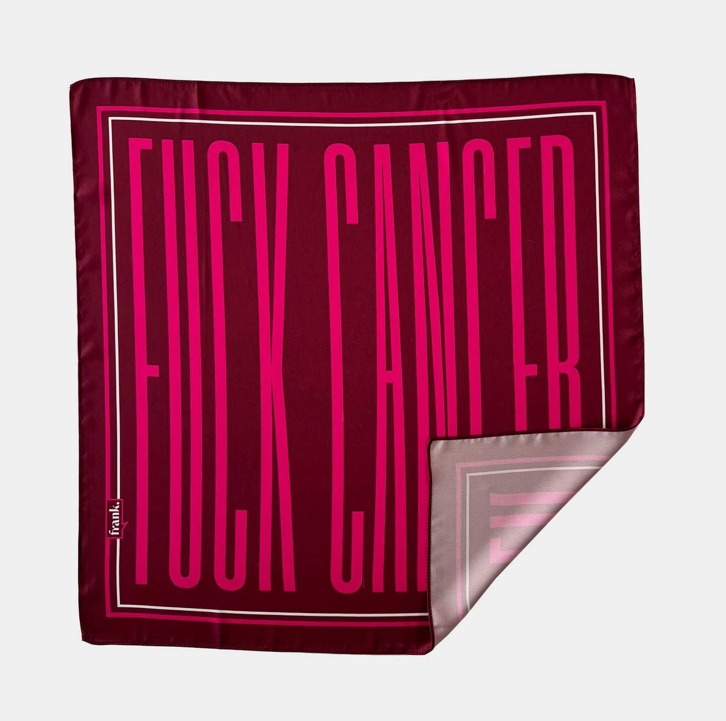 Burgundy scarf with bold hot pink text on a plain background. Text reads 'Fuck Cancer'. Corner is turned up on scarf to show reverse side.