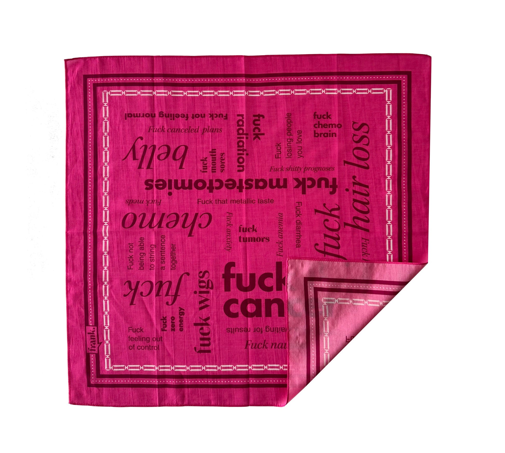 Hot pink bandana with burgundy text with words around 'Fuck Cancer'. The corner is turned up revealing the backside of the fabric showing one-sided printing.
