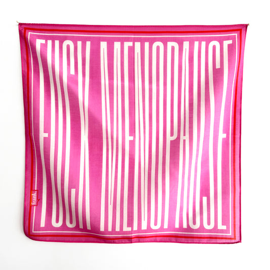 Pink silk blend scarf / handkerchief with white text on a white background. Elongated text reads: Fuck Menopause.