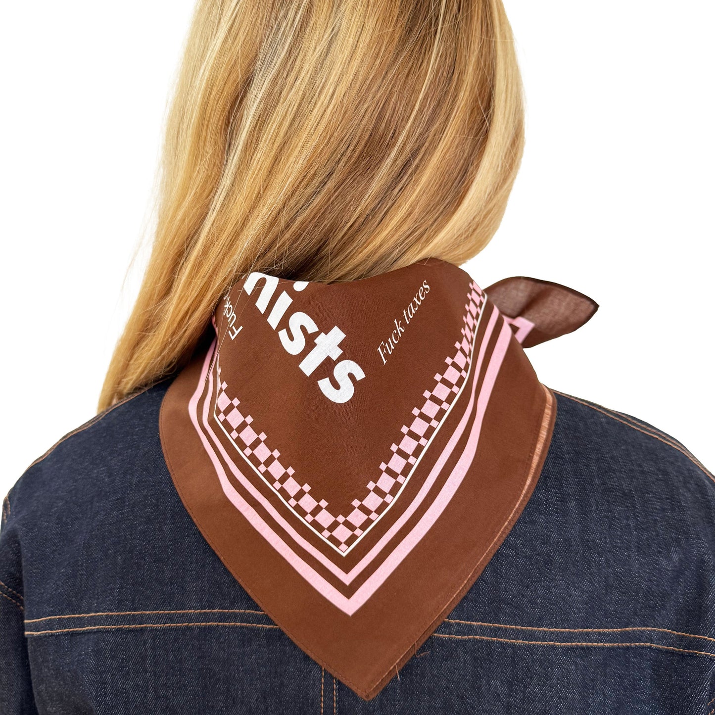 Backview of a person wearing a brown bandana with white text and pale pink border on a white background