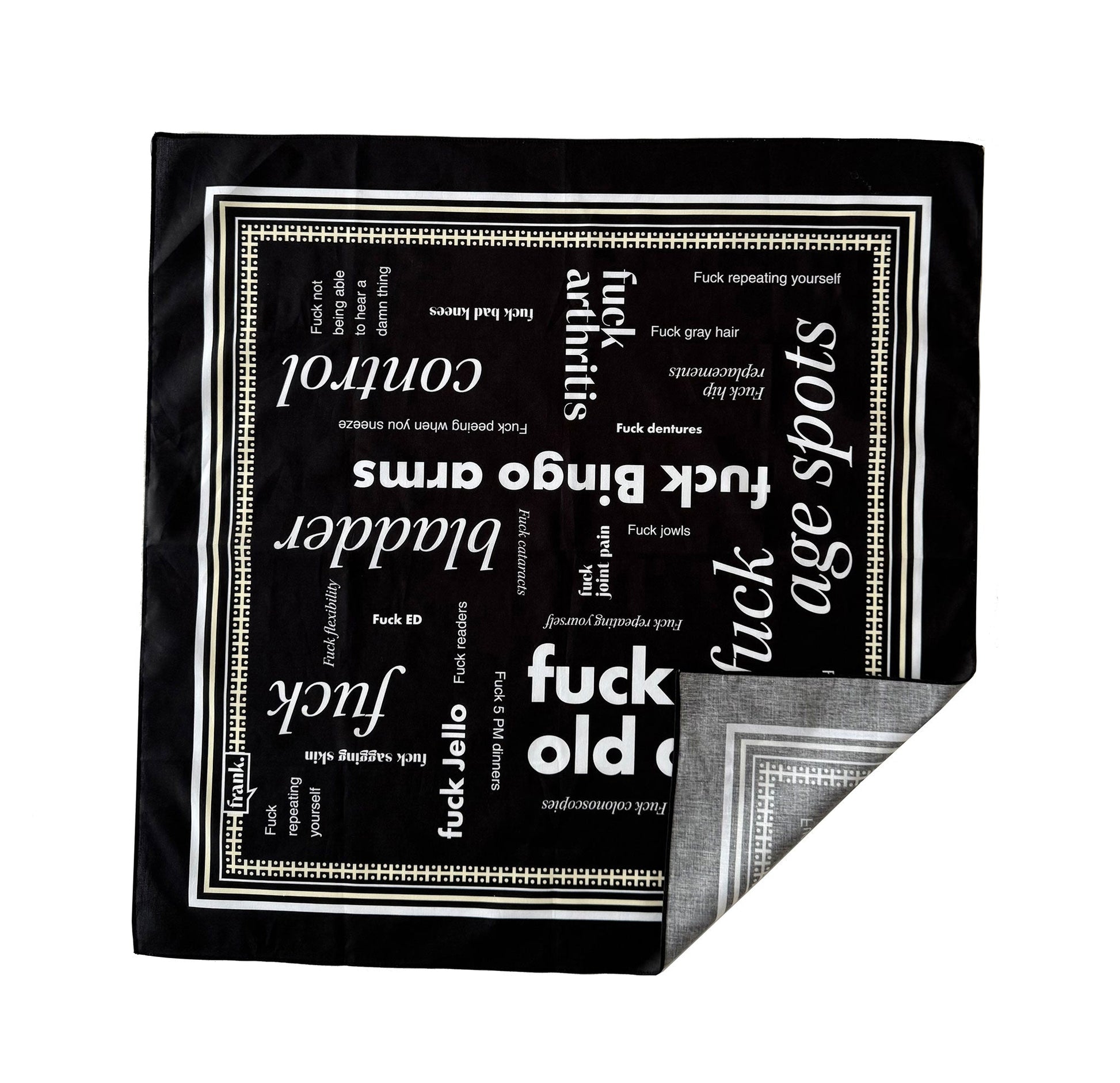 Black 'Fuck Old Age' bandana with words around aging, the bandana corner is turned up to reveal unprinted back side of bandana.