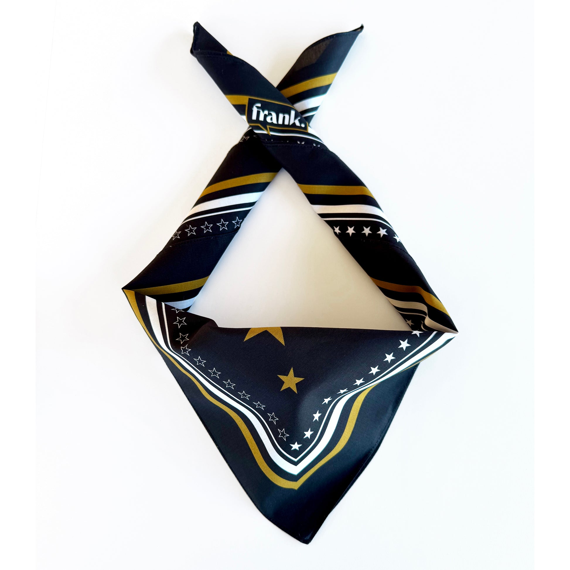 Black bandana with gold and white patterns on a white background