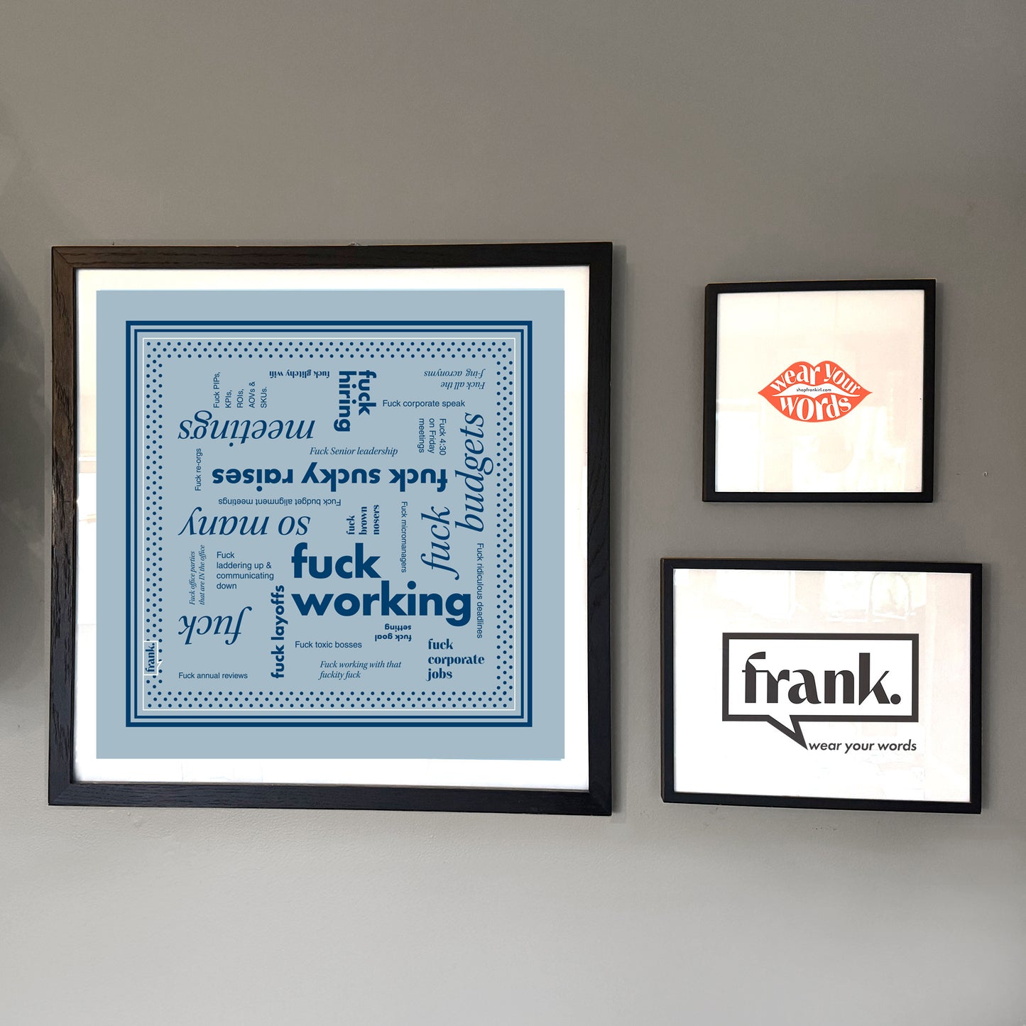 Fuck Working framed bandana on a wall with other framed items.