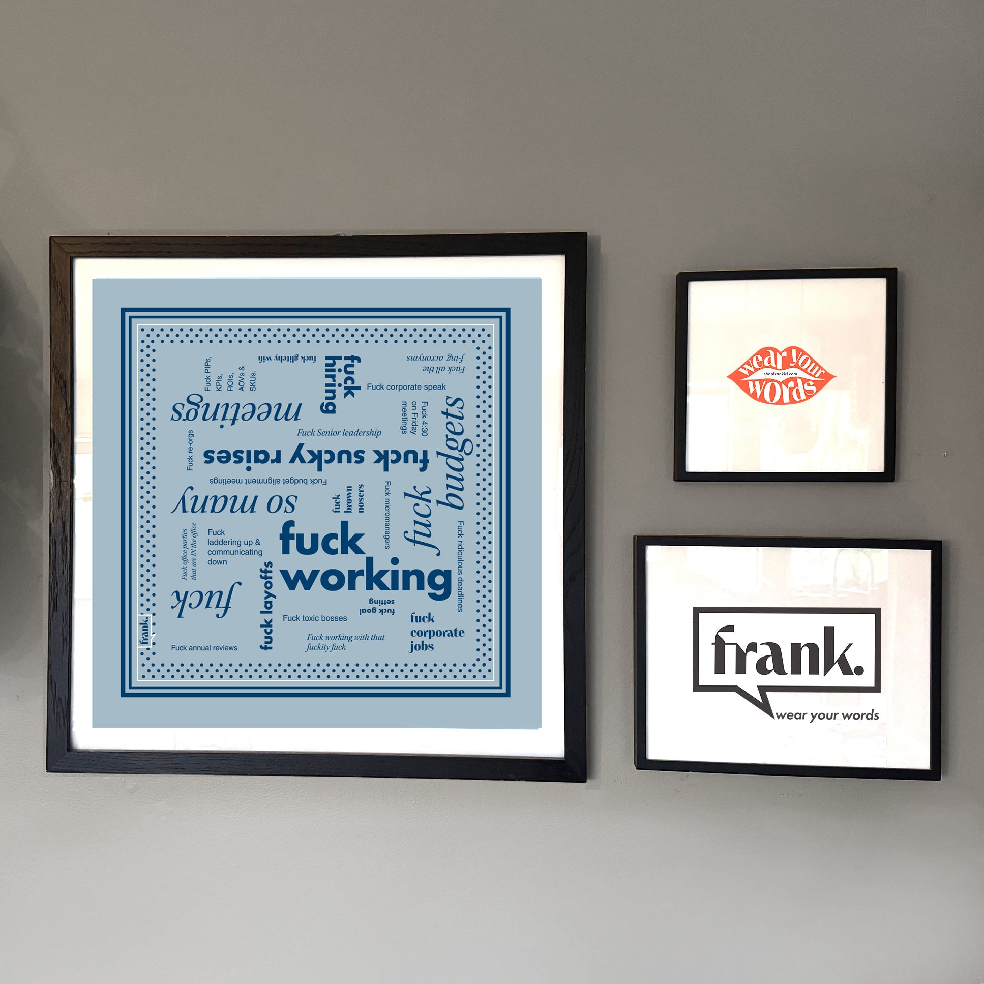 Fuck Working framed bandana on a wall with other framed items.