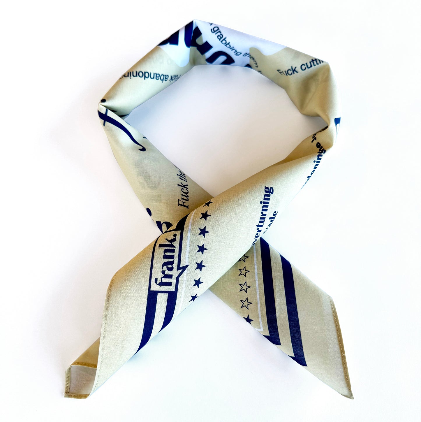 Folded bandana as one would wear around the neck with printed text and graphics on a white background