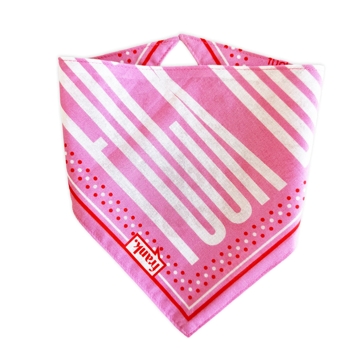 Pet bandana folded into a triangle, with bold white stripes against a pink background. The border of pet bandana is orange and white polka dots and a brand tag reading 'frank.'